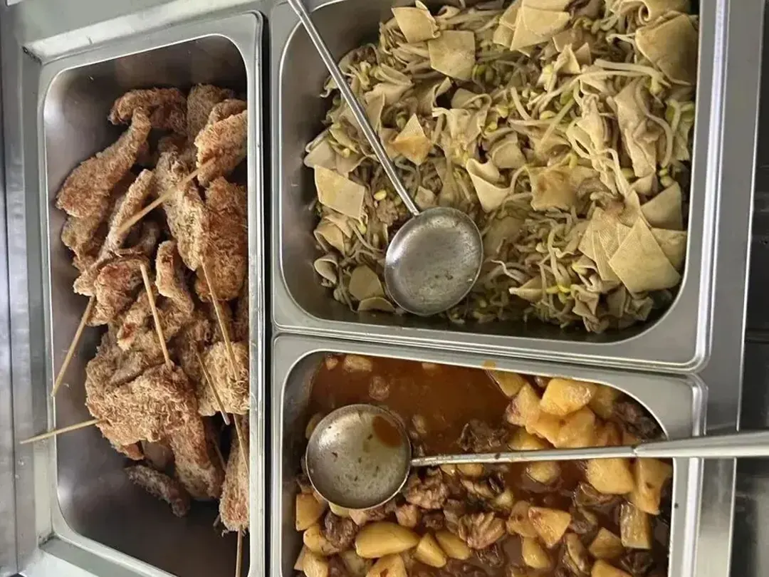 Fried dishes and stewed potato at Shaolin Zhongwu canteen