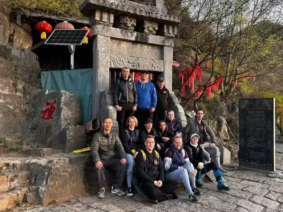 International students group photo at a heritage site during the study tour