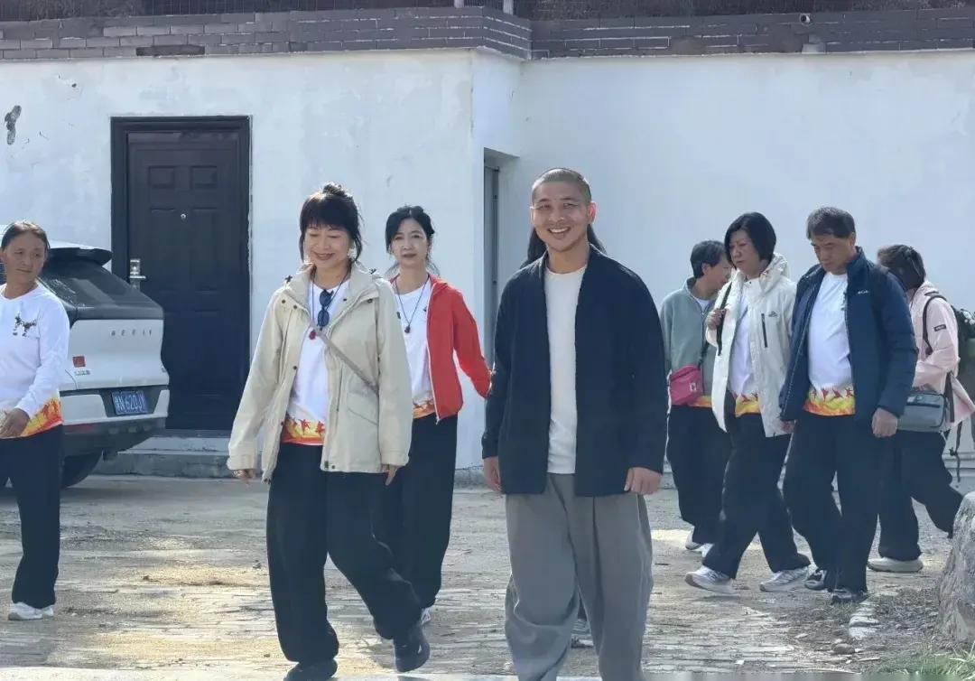 Macao delegation walking through the Shaolin Zhongwu campus