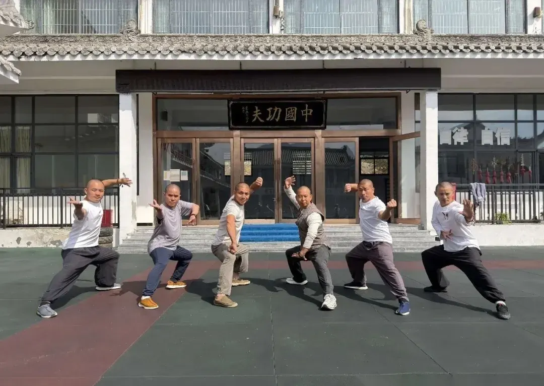 Shaolin Zhongwu students demonstrating stances during the exchange