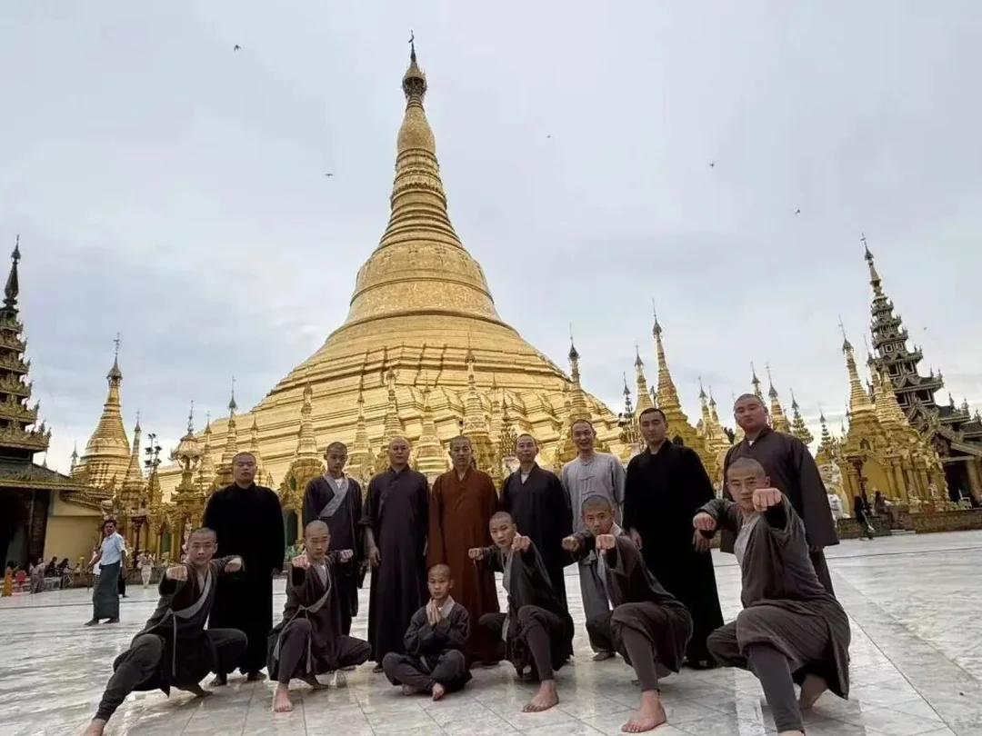 Shaolin Zhongwu performance team group photo at Shwedagon Pagoda plaza in Yangon Myanmar