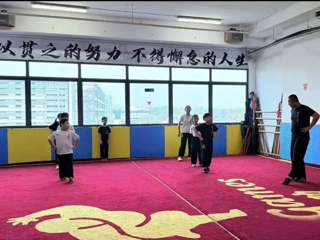 Young students lining up for basic training at the Shaolin Cultural Center in Singapore