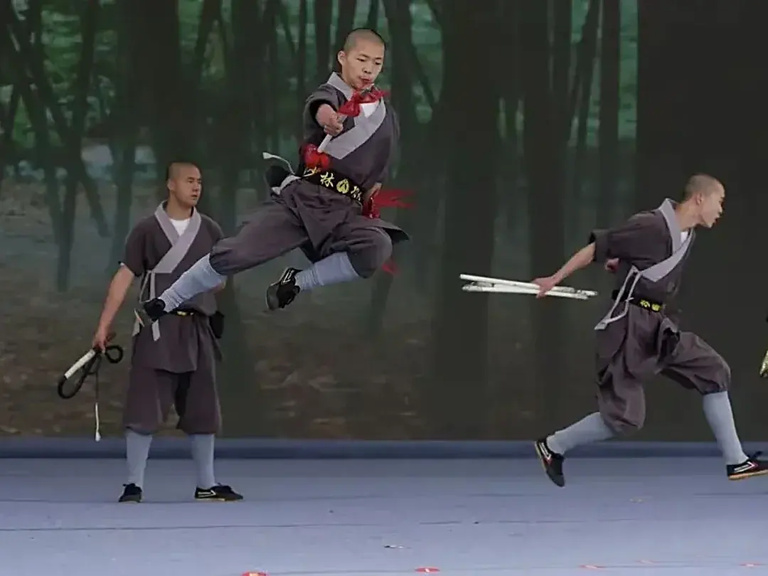 Shaolin Zhongwu students performing traditional weapons at the tournament